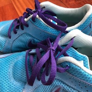 Teal and purple Nikes